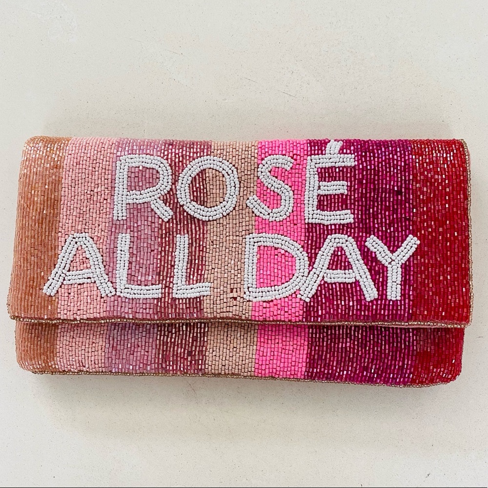 Francesca's Collections Pink and Red Beaded Clutch